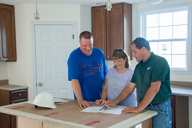 family in custom home kitchen